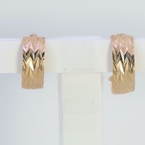 Gold tone semi-hoop post earrings, chevron imprint